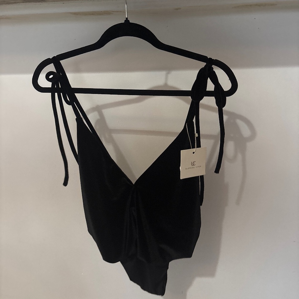 Bodysuit undress code